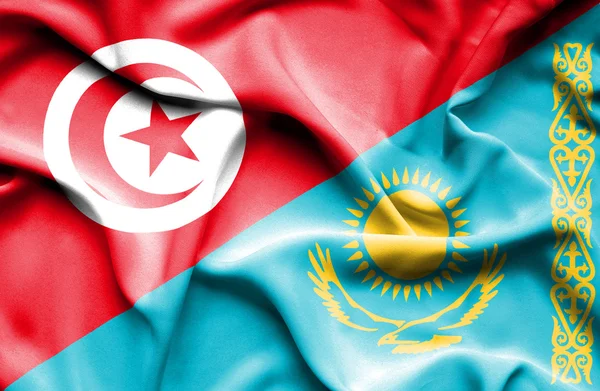 Waving flag of Kazakhstan and Tunisia — Stock Photo, Image