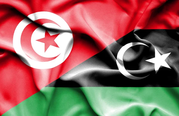 Wapperende vlag van Libië en Tunesië — Stockfoto