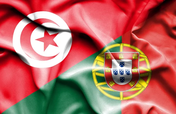Mávání vlajkou Portugalska a Tuniska — Stock fotografie