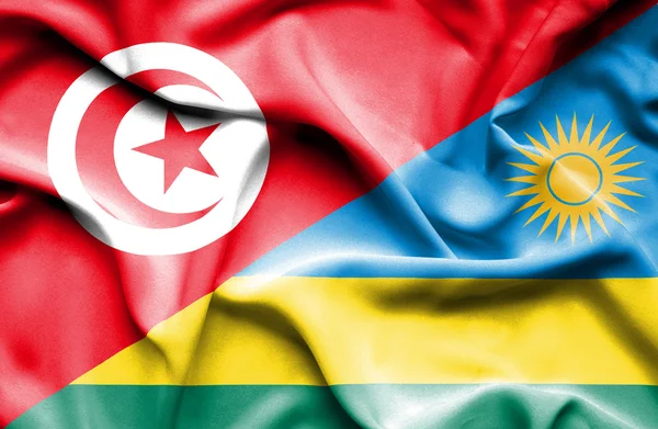 Flagge Ruandas und Tunesiens schwenken — Stockfoto
