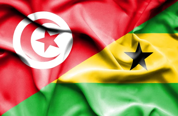 Wapperende vlag van sao Tomé en principe en Tunesië — Stockfoto