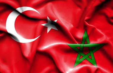 Fas ve Türkiye'nin bayrak sallayarak
