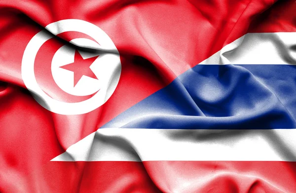 Waving flag of Thailand and Tunisia — Stock Photo, Image