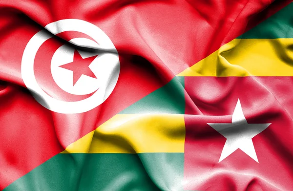 Flagge von Togo und Tunesien schwenken — Stockfoto