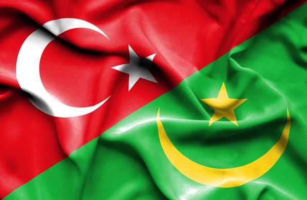 Waving flag of Mauritania and Turkey — Stock Photo, Image