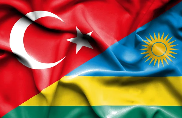Flagge Ruandas und der Türkei schwenken — Stockfoto