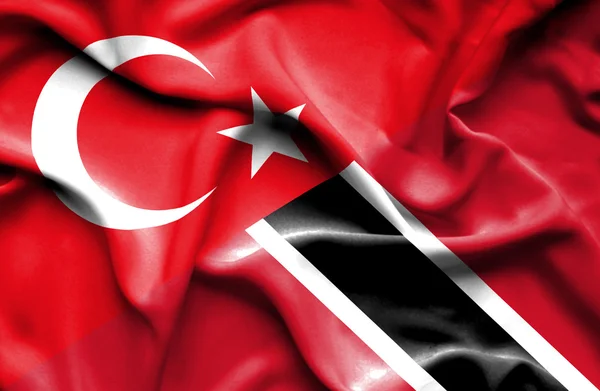 Trinidad och tobago och Turkiet viftande flagga — Stockfoto