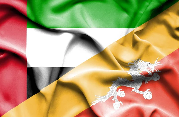 Waving flag of Bhutan and United Arab Emirates — Stock Photo, Image