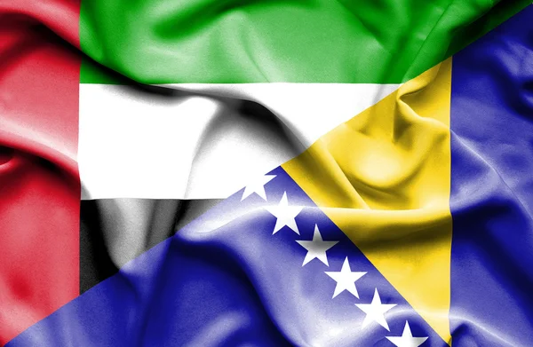 Wapperende vlag van Bosnië en herzegovina en Verenigde Arabische Emiraten — Stockfoto