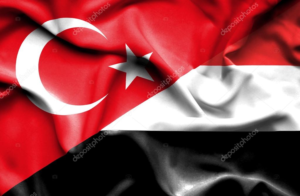 Waving flag of Yemen and Turkey