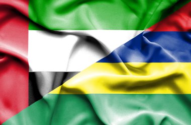 mauritius ve Birleşik Arap Emirlikleri bayrağı sallayarak