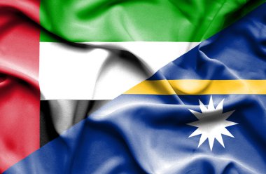 nauru ve Birleşik Arap Emirlikleri bayrağı sallayarak