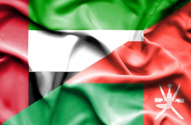 Umman ve Birleşik Arap Emirlikleri bayrağı sallayarak