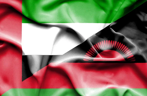 Bandiera sventola del Malawi e degli Emirati Arabi Uniti — Foto Stock