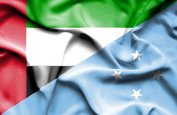 Waving flag of Micronesia and  United Arab Emirates — Stock Photo, Image