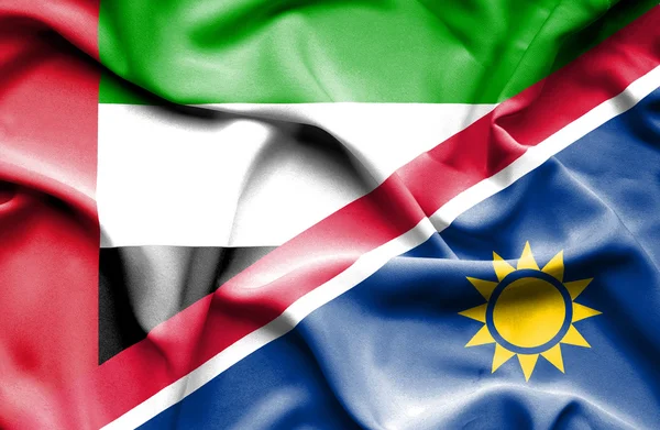 Розмахуючи прапором Намібії та Об'єднані Арабські Емірати — стокове фото