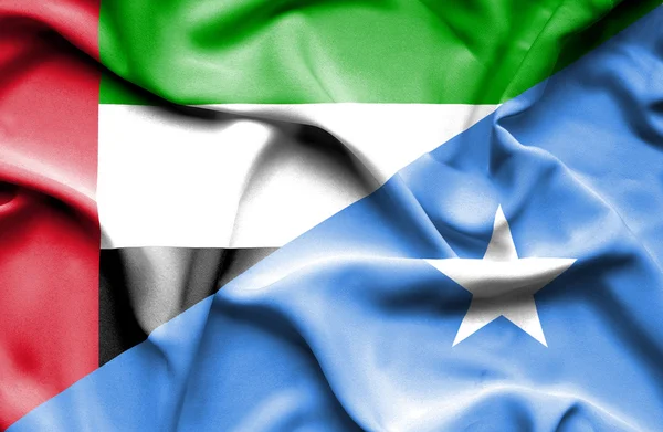 Waving flag of Somalia and United Arab Emirates — Stock Photo, Image
