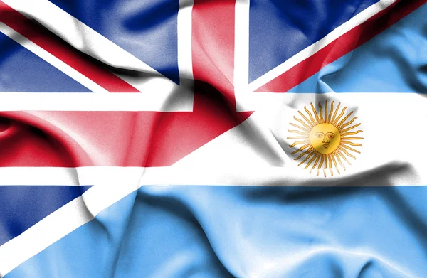 Flagge Argentiniens und Großbritanniens geschwenkt — Stockfoto