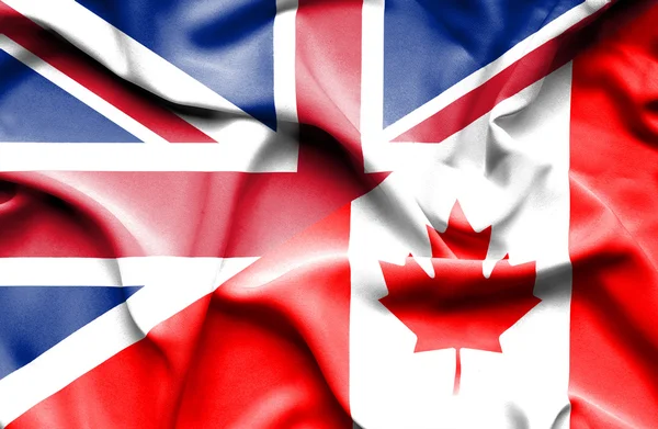 Vlající vlajka Kanady a Velké Británie — Stock fotografie
