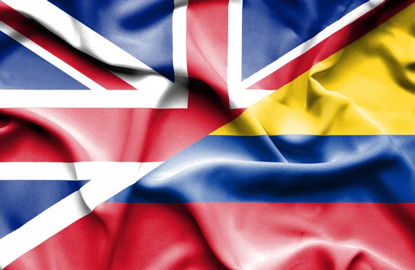 Flagge Kolumbiens und Großbritanniens schwenken — Stockfoto