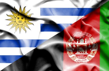 Waving flag of Afghanistan and Uruguay