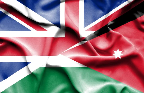 Wapperende vlag van Jordanië en Groot-Brittannië — Stockfoto