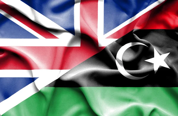 Libya ve Büyük Britanya bayrağı sallayarak — Stok fotoğraf