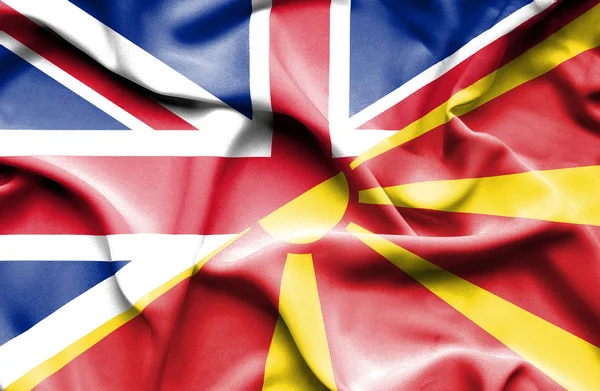 Waving flag of Macedonia and Great Britain — Stock Photo, Image