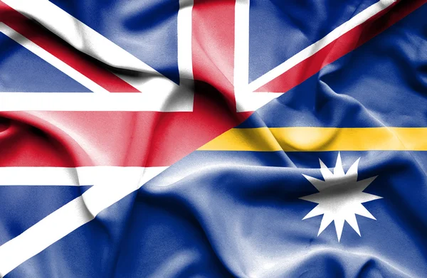 Waving flag of Nauru and Great Britain — Stock Photo, Image
