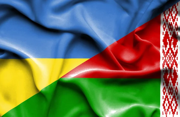 Machać flaga Białorusi i Ukrainy — Zdjęcie stockowe