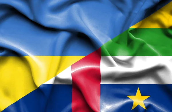 Waving flag of Central African Republic and Ukraine — Zdjęcie stockowe