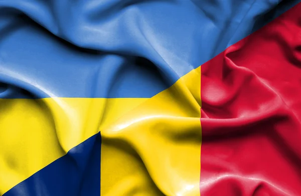 Waving flag of Chad and Ukraine — Stok fotoğraf