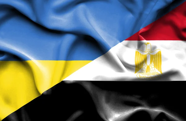 Waving flag of Egypt and Ukraine — Stock Photo, Image