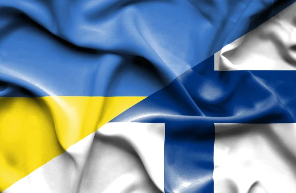 Waving flag of Finland and Ukraine — Stock Fotó