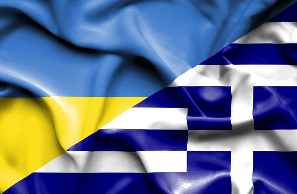 Ondeando la bandera de Grecia y Ucrania —  Fotos de Stock