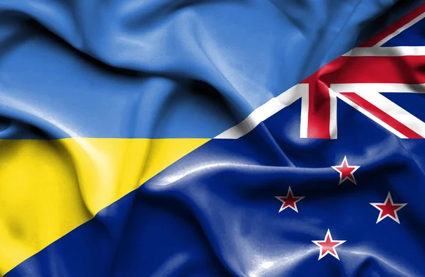 Waving flag of New Zealand and Ukraine — 图库照片