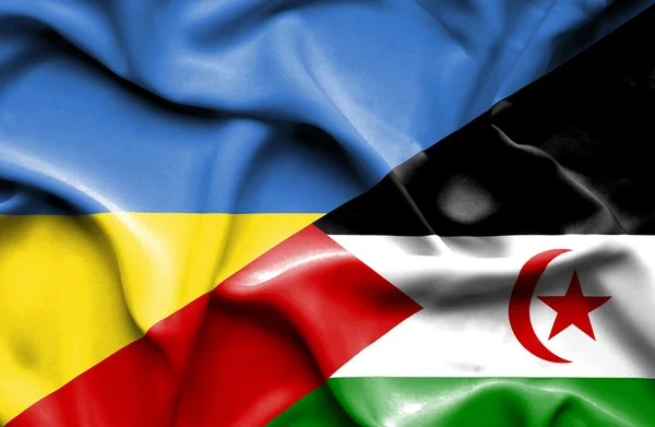 Waving flag of Western Sahara and Ukraine — Zdjęcie stockowe