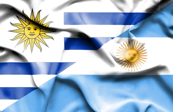 Waving flag of Argentina and Uruguay — Stockfoto