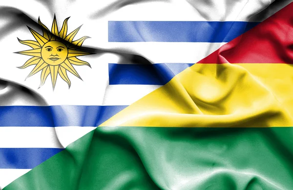 Waving flag of Bolivia and Uruguay