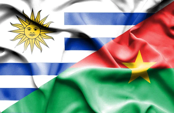 Waving flag of Burkina Faso and Uruguay