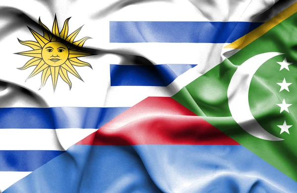 Waving flag of Comoros and Uruguay — Zdjęcie stockowe