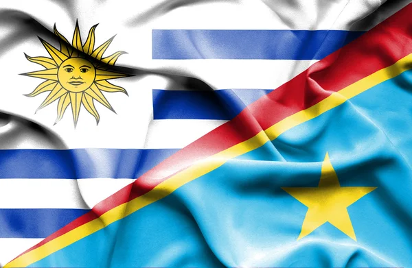 Waving flag of Congo Democratic Republic and Uruguay — Stock Photo, Image