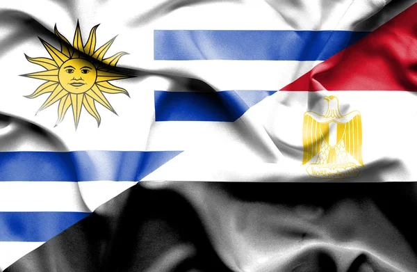 Waving flag of Egypt and Uruguay — 스톡 사진