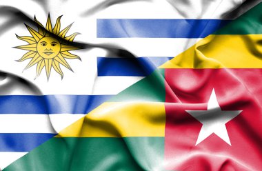 Waving flag of Togo and Uruguay