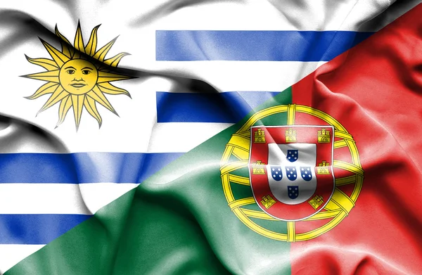 Bandera ondeante de Portugal y Uruguay —  Fotos de Stock