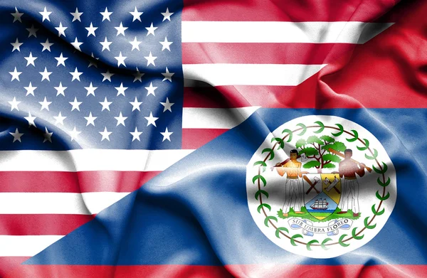 Wapperende vlag van belize en Verenigde Staten — Stockfoto