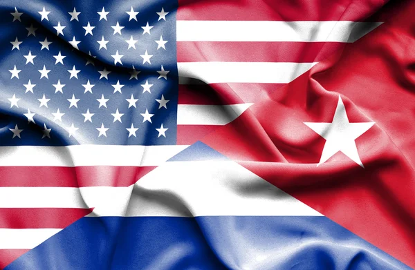 Waving flag of Cuba and USA — Stock Photo, Image