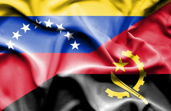 Waving flag of Angola and Venezuela — Stockfoto