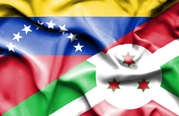 Waving flag of Burundi and Venezuela — Stockfoto