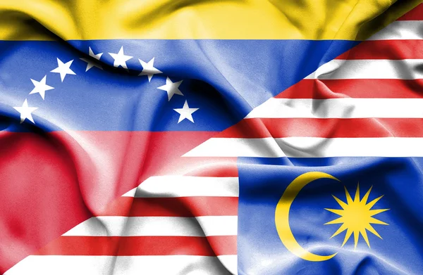 Waving flag of Malaysia and Venezuela — Stockfoto